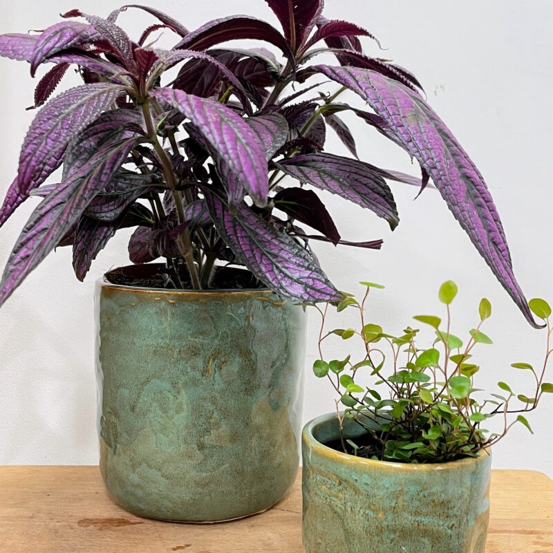 green iron stone pink glazed pot