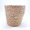 Beautiful woven basket made of natural materials, showcasing artisanal craftsmanship and earthy tones.