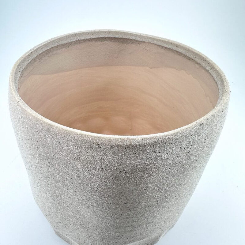 Sand Effect Planter Minimalist cylindrical planter with textured concrete finish, blending rustic charm and modern design.