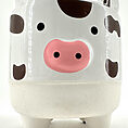 Ceramic cow planter with cartoon design, glossy finish, perfect for plants or decor.