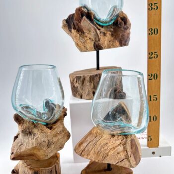 Elegant drinking glasses on rustic wooden bases, enhancing home decor and entertaining styles.