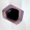 Unique lavender hexagonal ceramic vase with contrasting black interior, perfect for home decor.