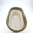 Elegant ceramic bowl with rustic tan glaze and glossy beige interior, perfect for decor or use.