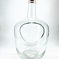 Elegant glass bottle with modern design and cork stopper, featuring a unique cutout for functionality.