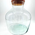 Elegant glass jar with cork lid, perfect for storage or decorative use in any setting.