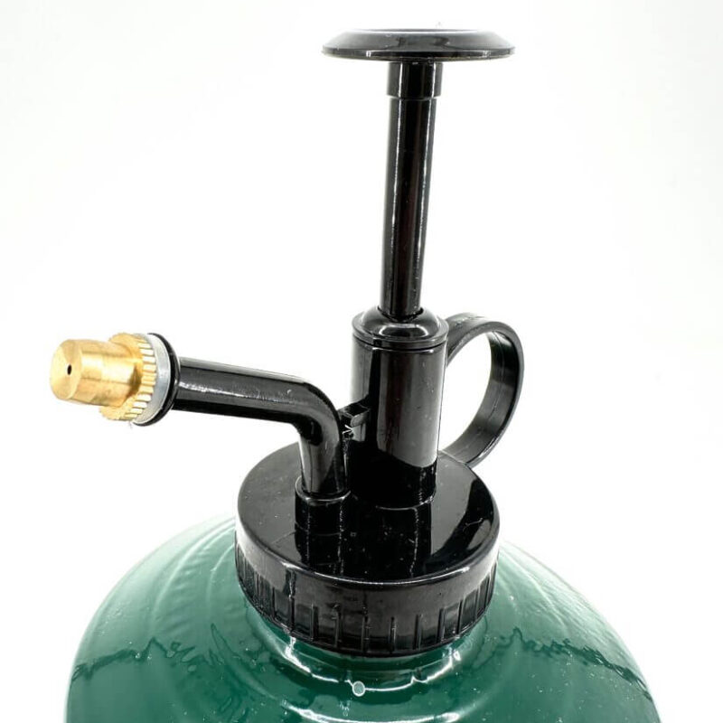 Ergonomic Green Camping Gas Canister Close-Up Close-up of a green camping gas canister with ergonomic nozzle and safety features.