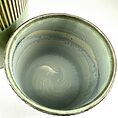 Ceramic bowl and vessel with aqua glaze, showcasing artisan craftsmanship and elegant design.