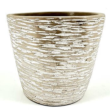 Rustic clay planter with textured surface and coastal aesthetic, suitable for various plants.
