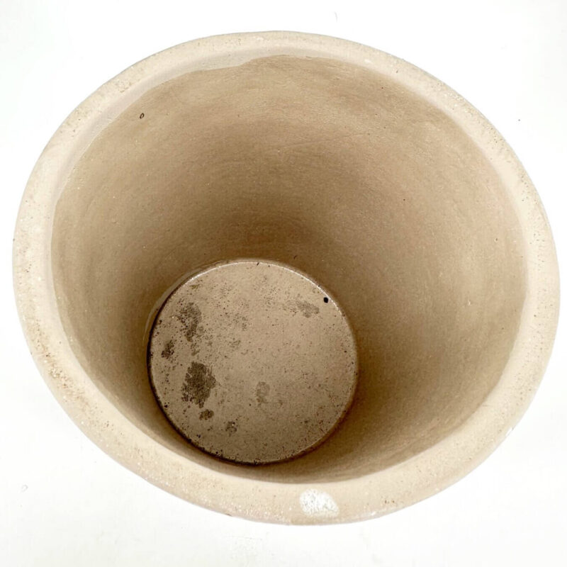 Elegant Minimalist Ceramic Pot from Above View Minimalist ceramic pot top view, beige, smooth finish, ideal decorative planter.