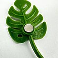 Monstera leaf magnet, green decorative accent for home or office organisation.