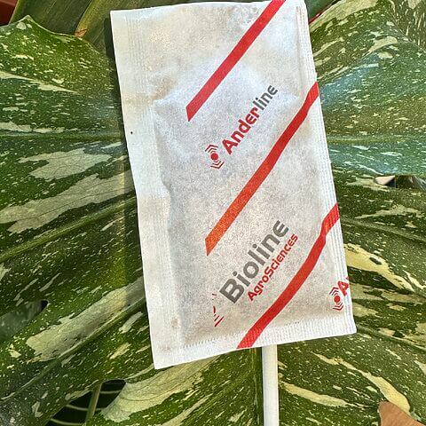Bioline Agrosciences Anderline packet on green leaf, agricultural plant care product.