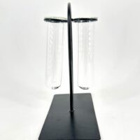 Minimalist black metal test tube holder, perfect for laboratory or decorative use.