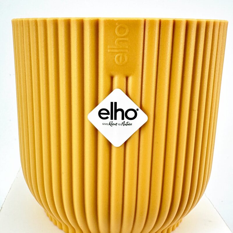 Eco-Friendly Yellow Planter with Ribbed Design Yellow ribbed elho planter with eco-friendly message, perfect for stylish, sustainable gardening.