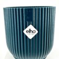 Elho teal planter with ribbed texture, stylish and sustainable for modern indoor/outdoor decor.