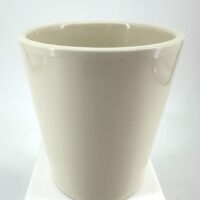 Elegant tapered white ceramic pot with glossy finish on a white pedestal.
