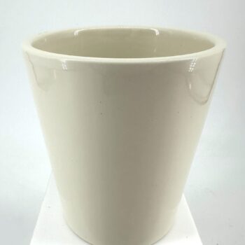 Elegant tapered white ceramic pot with glossy finish on a white pedestal.