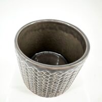 Sleek grey ceramic pot with woven pattern on white background, modern home decor.