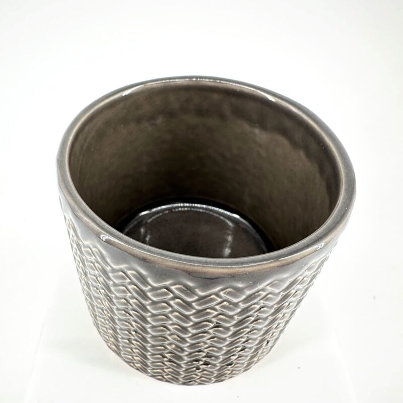 Elegant Woven Texture Grey Ceramic Pot Sleek grey ceramic pot with woven pattern on white background, modern home decor.