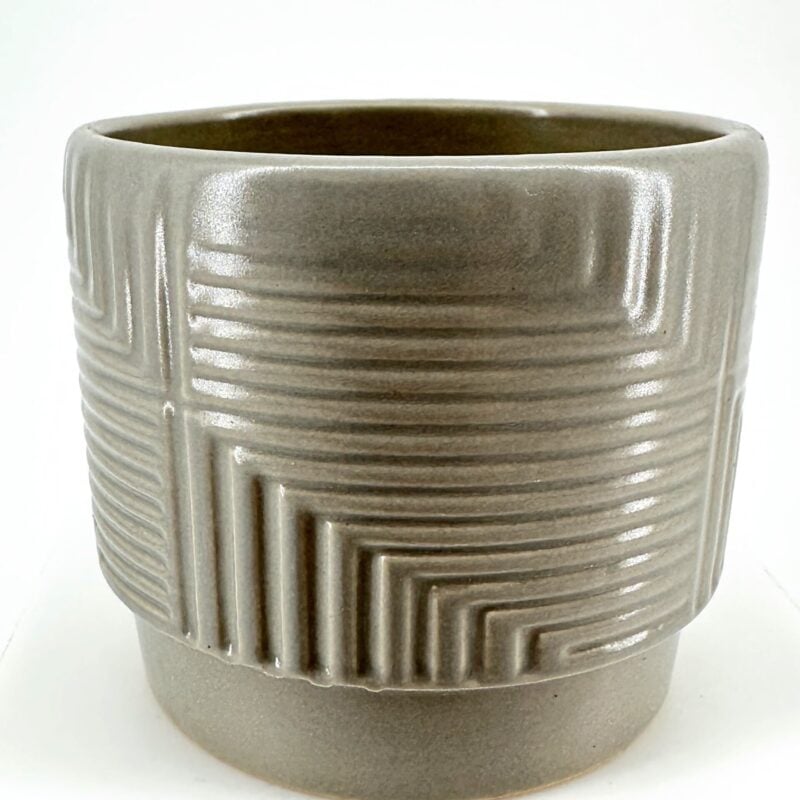 Stylish Grey Ceramic Planter with Geometric Texture Modern grey ceramic pot with geometric textured design and glossy interior.