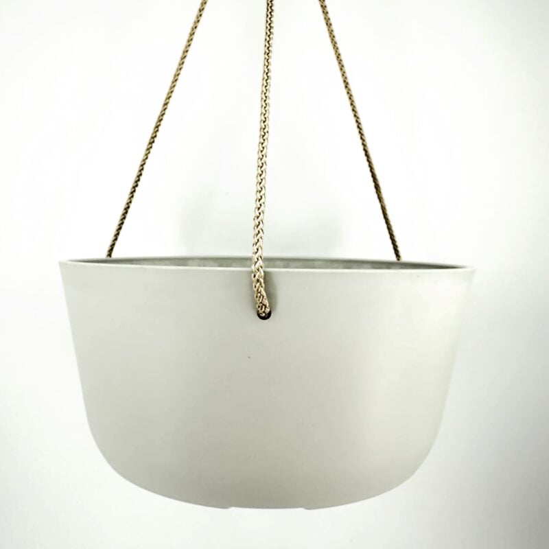 Elegant Minimalist Hanging Planter with Gold Accents Modern minimalist hanging planter with glossy white ceramic body and gold-toned braided ropes.