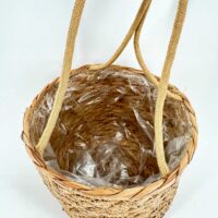 Natural seaweed basket planter with inner plastic liner and rustic texture