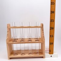 Wooden test tube propagation stand beside height ruler showing compact size