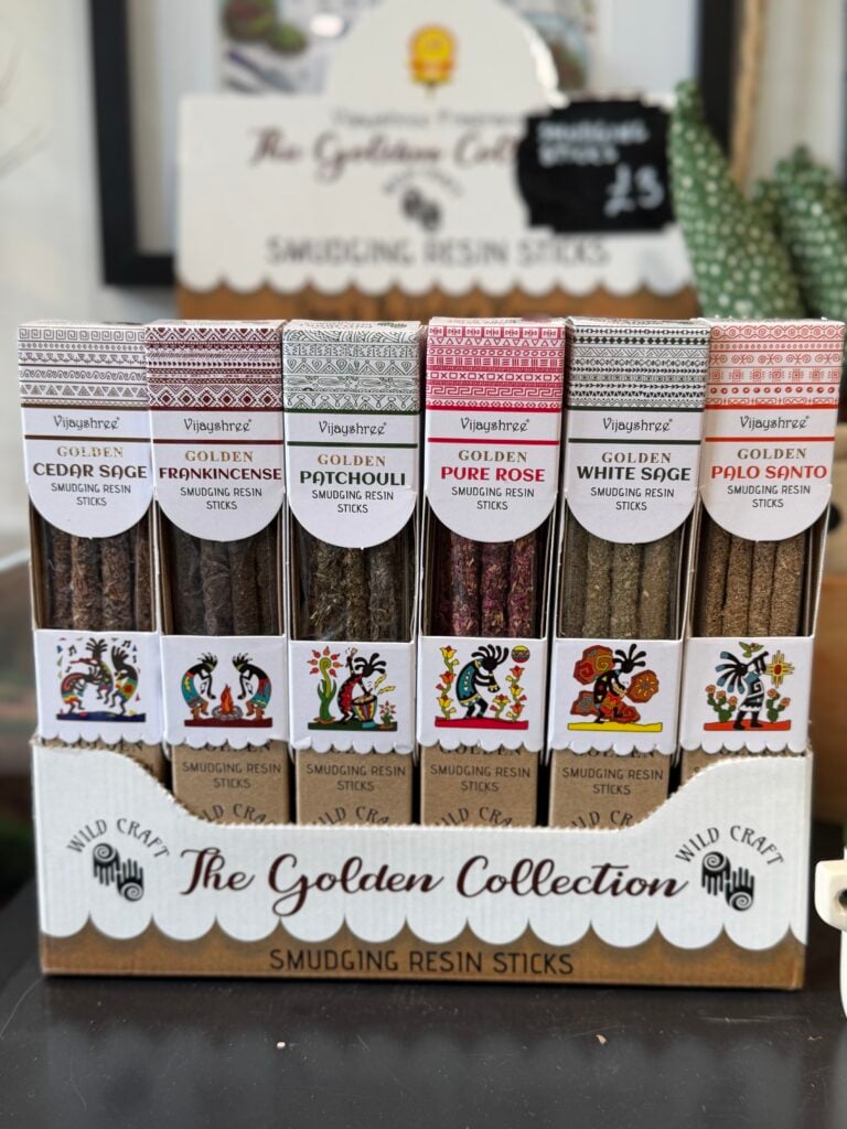 Golden resin incense stick collection with six fragrances displayed together
